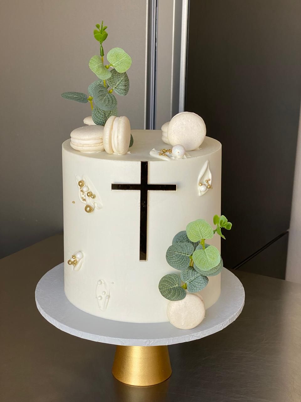 Eucalyptus & Macaron Christening — a custom cake by Sky Cakes