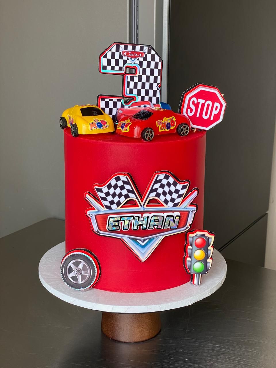 Lightning Racer Red — a custom cake by Sky Cakes